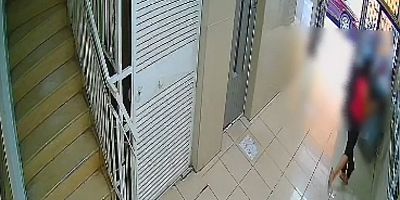 Adana’da iş merkezinde taşlı saldırı kamerada