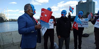 Çin'i maske takarak protesto ettiler